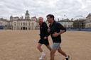 Ultra-runner Russ Cook and Prime Minister Rishi Sunak run past London’s landmarks (Rishi Sunak/PA)