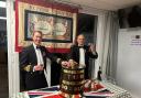 Lt.-Cdr. Martyn Mayger and PO Dave Morris of TS Saumarez with a tot from the rum tub of the famous WWII destroyer HMS Saumarez