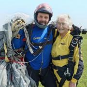 Skydiver Barbara Mence with her instructor