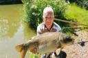 Bob Wooster with a mirror Carp from Newbarn