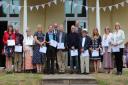East Devon District Council Chairman Cllr Andrew Moulding and Vice Chairman Cllr David Key, pictured with some of the arts champions at the Chairman’s recent Garden Party. Picture: Contributed