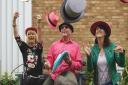 'Mad hatter' Terry  Darville (centre) with neighbour Steph Story (right) and Exmouth Art Trail curator, Anna Fitzgerald.
