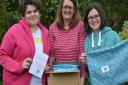 Harriet, Lin and Evie Coley, with the first consignment of drawstribg bags for NHS staff. Picture: Andrew Coley