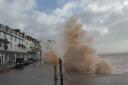 Huge waves crashing over Sidmouth seafront during Storm Eunice