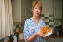 Denise Bakewell at home with some teacakes. Ref shs 31 18TI 9100. Picture: Terry Ife