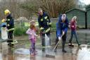 The clean-up operation at Tipton St. John Primary School gets underway with the help of Sidmouth firefighters. Ref sho Tipton Clean-up 03. Picture: submitted