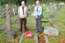 Robin Laird and Dave O'Connor at the grave of Charles Graham Swann