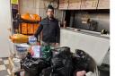 Omer Akbulut of the Charcoal Grill Kebab Shop with donations from Ottery residents
