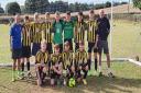 West Hill Wasps Junior Football Team's under-13 squad with coach Allen Morgan, far left