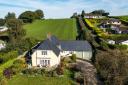 The substantial dwelling sits on a plot of around 1/2 acre in the pretty hamlet of Wiggaton   Pictures: Bradleys, Sidmouth