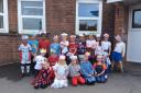 Sidmouth Primary School also held a coronation party with pupils dressing up.