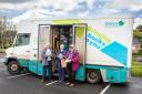 One of Devon's mobile library vans, with users of the service.