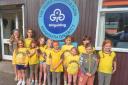 Sidmouth Brownies outside Sidmouth District Girl Guide Headquarters.