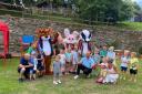 Children with John Fowler Holidays' Foxy Club characters at Killigarth Manor