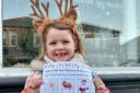 Five-year-old Bobbie taking part in Nailsea's festive window trail.