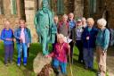 The Coleridge Heritage Walk group at the newly unveiled statue outside the church