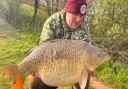 Scott Bryant with an 18lb Carp from Newbarn Angling Centre