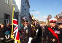 The Queen's Colours leading last year's Remembrance Sunday parade