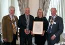 Last year's award: Town council chair Cllr Chris Lockyear, Ron Loynd, Teresa Loynd and Sidmouth Rotary president Bob Underhill