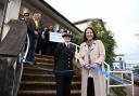 Cutting the ribbon at the reopening of Newton Abbot's police station enquiry desk