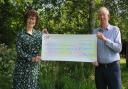 Sheila Meades, representing the Sid Valley Biodiversity Group, receiving the cheque from  Alan Clarke, SVA Keith Owen Fund Committee Chair