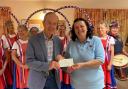 Derek Price and June Ward of Sidmouth Voluntary Services with Sidmouth Steppers