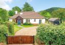 This chalet-style bungalow occupies a third of an acre plot on the fringes of Sidmouth  Pictures: Bradleys, Sidmouth