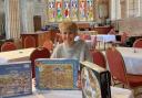 Sue Jeacock, parish administrator, with some of the jigsaw puzzles