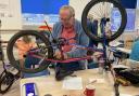 Fixing a bike at Sidmouth Repair Cafe
