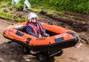 Alice Dutton of Sidmouth Lifeboat taking part in the Otterton Soap Box Derby on Easter Monday