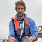 Daniel Patrick with a brace of Plaice caught from his own boat