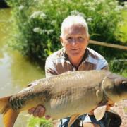 Bob Wooster with a mirror Carp from Newbarn