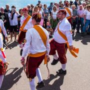 Morris dancing on the seafront. Picture: Sidmouth Folk Festival