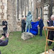 The moment the statue was unveiled