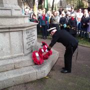 Lieutenant-Commander (Rtd) Chris Pink lays a wreath on behalf of Sidmouth Royal Naval Old Comrades Association