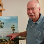 Artist Ray Balkwill appraises the work of an SSA member