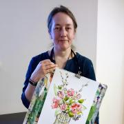 Anna Brewster with her artwork