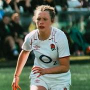 Ellie Wood playing for England.