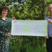Sheila Meades, representing the Sid Valley Biodiversity Group, receiving the cheque from  Alan Clarke, SVA Keith Owen Fund Committee Chair