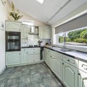 The classic kitchen is light, airy and spacious