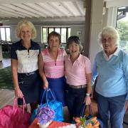 First prize winners ( L to R) Mo Borer, Sheila Tallon and Gill Paddon with Susan Hackett Lady Captain