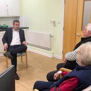 Simon Jupp talking to cancer patients at the hospital