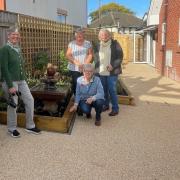 Members of Primley WI and Alasdair Cameron from Sidmouth Hospice at Home in the new garden