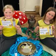 Scarlet and Lily with their Gold Awards