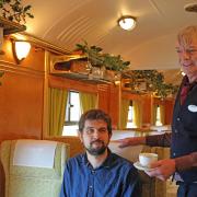 Serving tea in the Pullman carriage