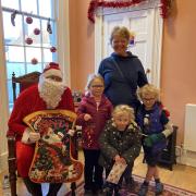 A family meeting Santa at Kennaway House