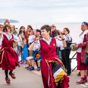 Dancers on the seafront at Sidmouth Folk Festival 2023