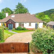 This chalet-style bungalow occupies a third of an acre plot on the fringes of Sidmouth  Pictures: Bradleys, Sidmouth