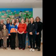 Dr Sara Hadfield, Dr Dell and some of the people who created the work including lead artist Maureen Hawkridge, U3A Exploring Art Group members and Sidmouth and District Guides