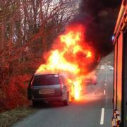 Fire appliance attending a blazing car